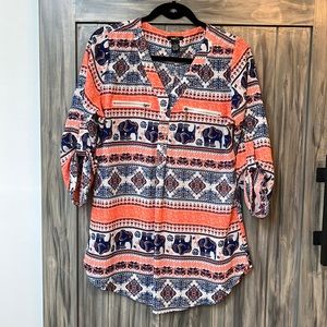 Ladies Rue 21 V Neck blouse size Large. With 2 fake zipper front pockets.